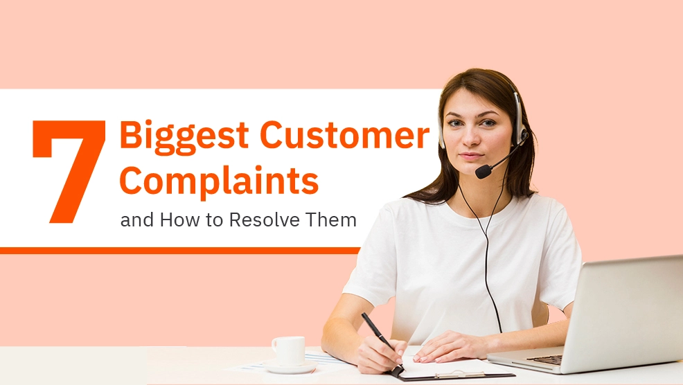Customer service representative with headset at laptop, text reads 7 Biggest Customer Complaints and How to Resolve Them